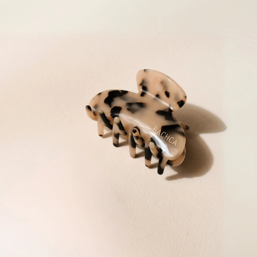 Bachca tortoiseshell claw clip on a neutral background