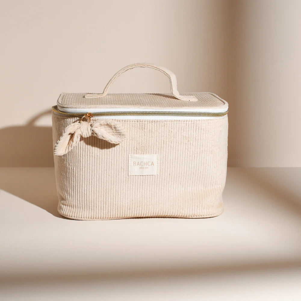 BACHCA vanity in sandy beige velvet with handle, placed on a cream background with soft natural lighting.